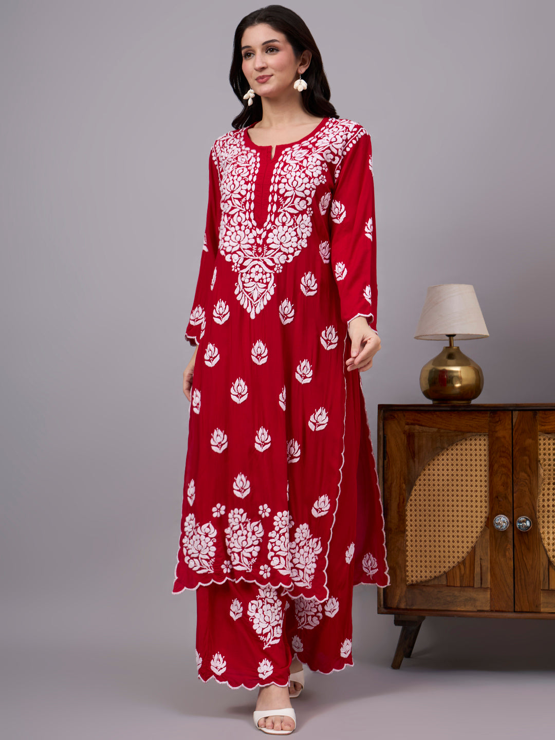 Elegant trending Chikankari set crafted with traditional embroidery techniques, premium modal fabric, straight kurti design, and coordinated palazzo for effortless ethnic fashion.