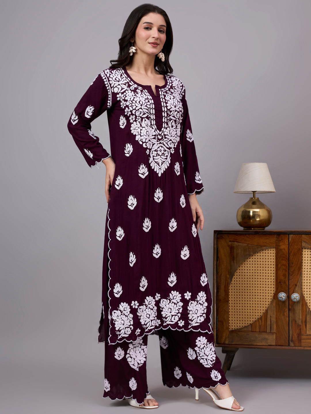 Women's handcrafted Modal Straight Kurti Palazzo Set featuring elegant Chikankari motifs, soft fabric texture, and versatile styling for multiple occasions.