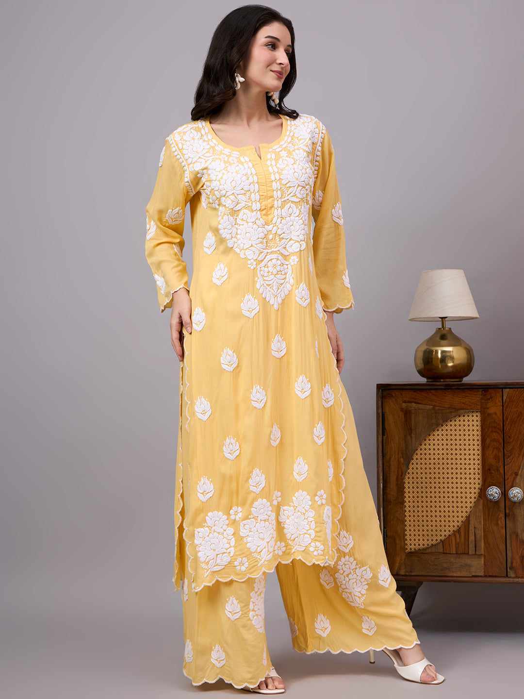 Premium Chikankari Kurta Set crafted from soft modal fabric with intricate handcrafted embroidery, straight silhouette, and coordinated palazzo for timeless ethnic fashion.