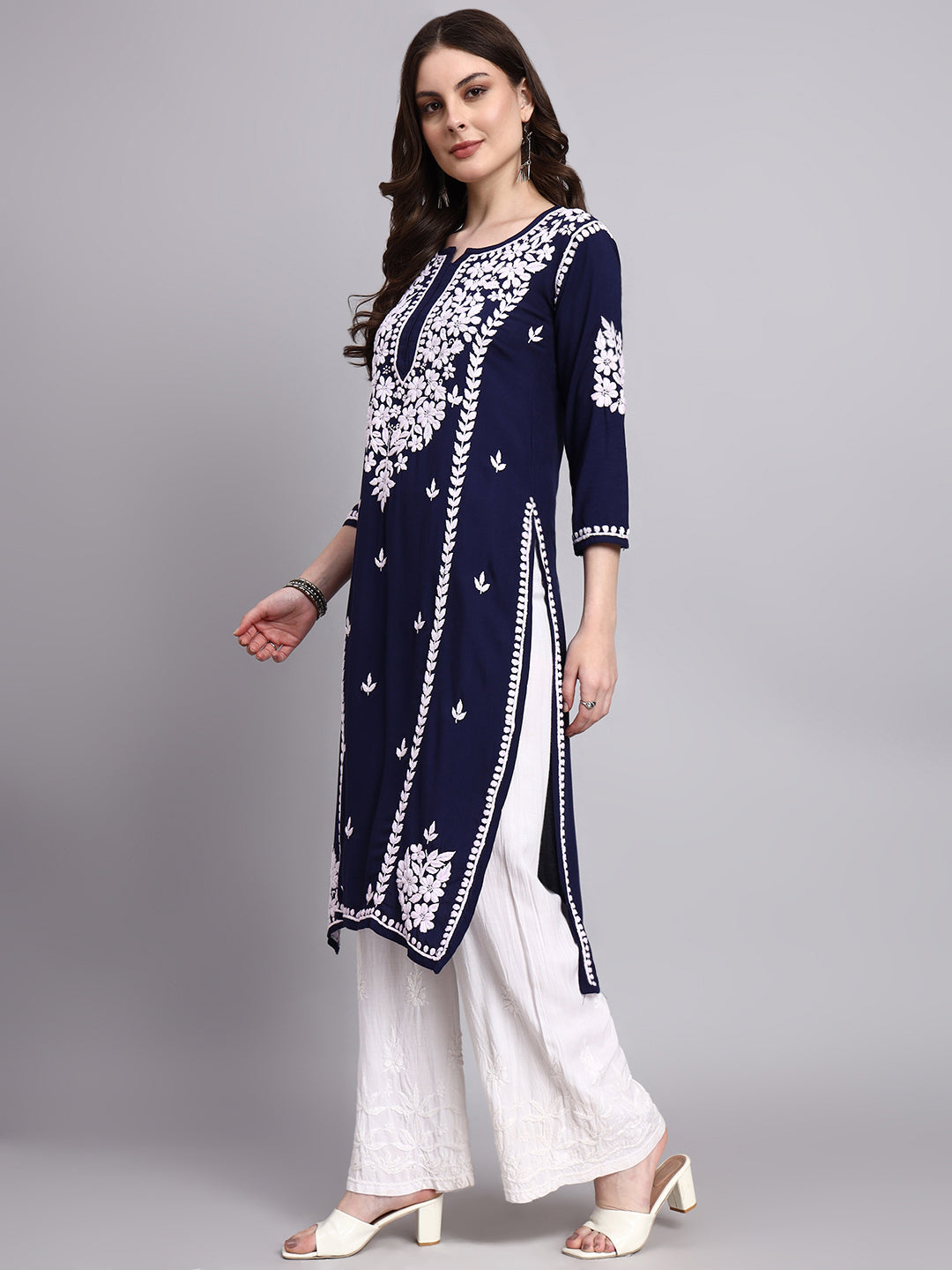 Premium women’s chikankari long kurta highlighting artisan craftsmanship breathable material and timeless design