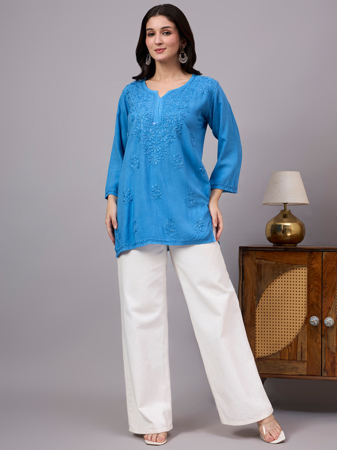 Women’s Chikankari top crafted in soft rayon fabric with beautiful embroidery patterns, perfect for everyday ethnic wardrobe essentials