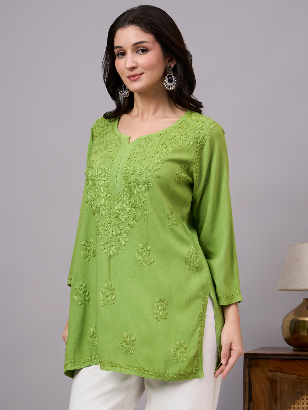 Everyday wear Rayon Short Kurta designed with delicate Chikankari embroidery and easy-to-style pattern for modern women’s clothing collection