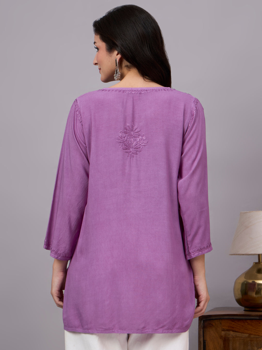 Handcrafted Chikankari short kurta for women made from lightweight rayon fabric with traditional embroidery and stylish casual ethnic appeal
