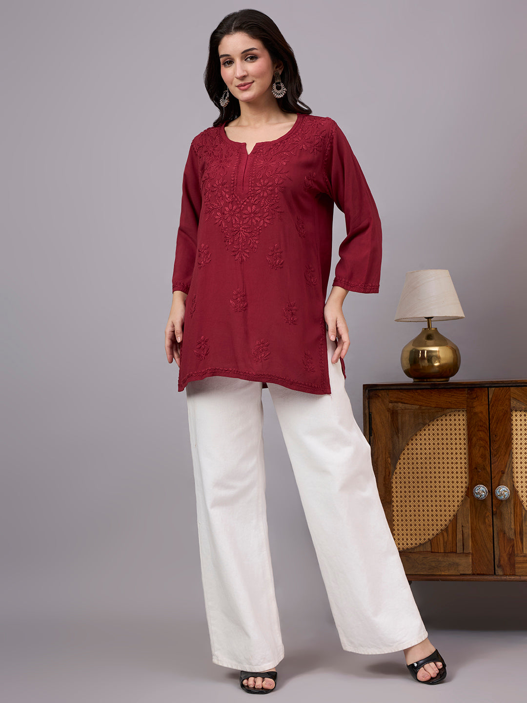 Beautiful women’s ethnic Chikankari top made from premium rayon fabric with detailed threadwork and versatile trending short kurta style for everyday elegance