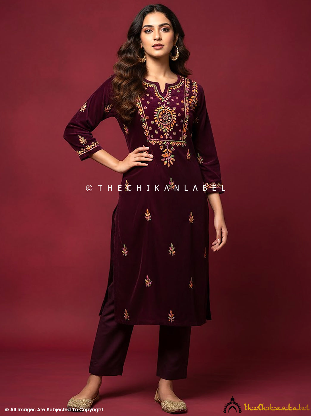 Designer velvet chikankari straight kurta highlighting exquisite handcrafted floral motifs suitable for premium ethnic fashion.
