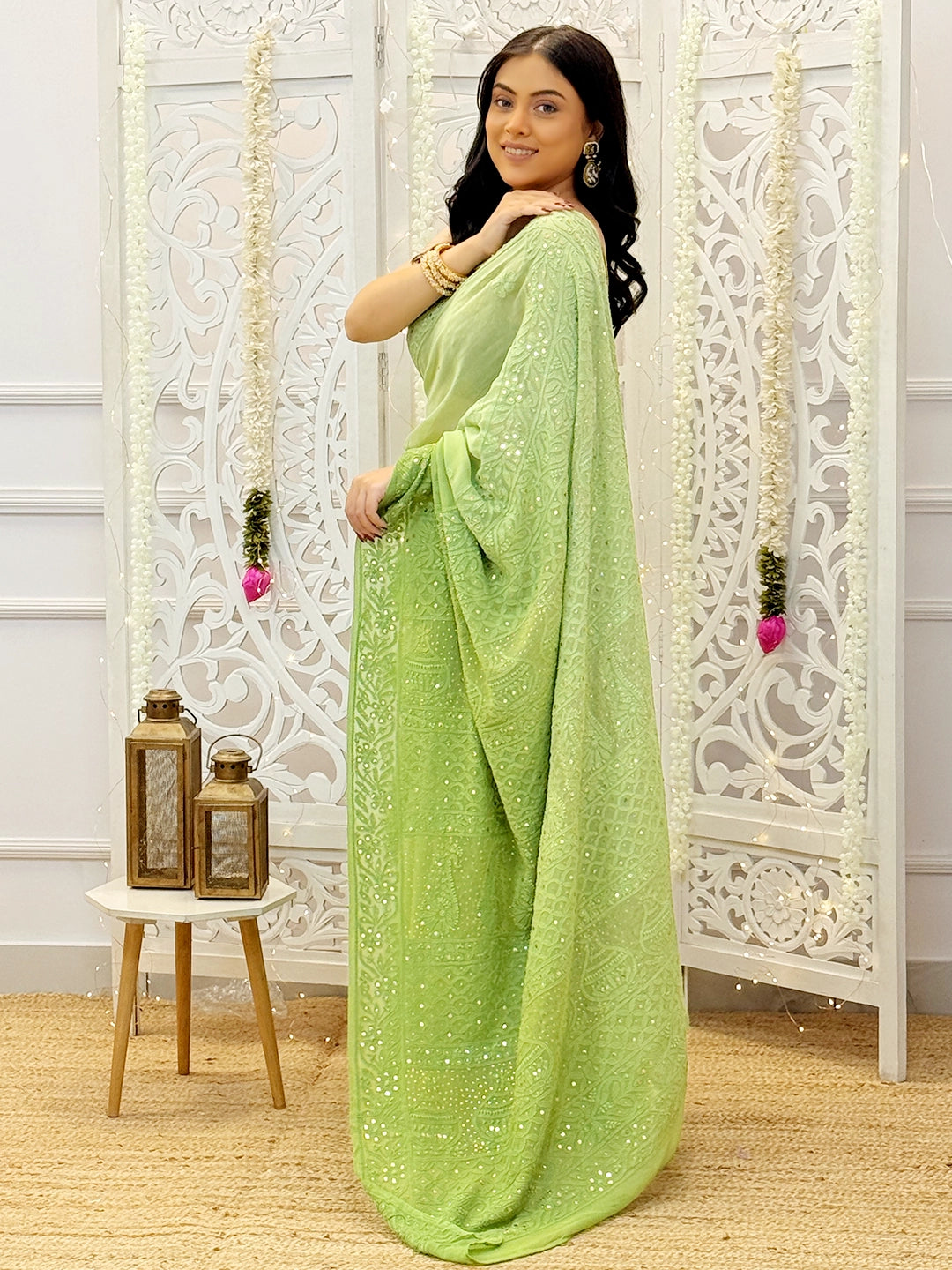 Traditional chikankari saree with mukaish embroidery and premium viscose fabric perfect for ethnic celebrations.