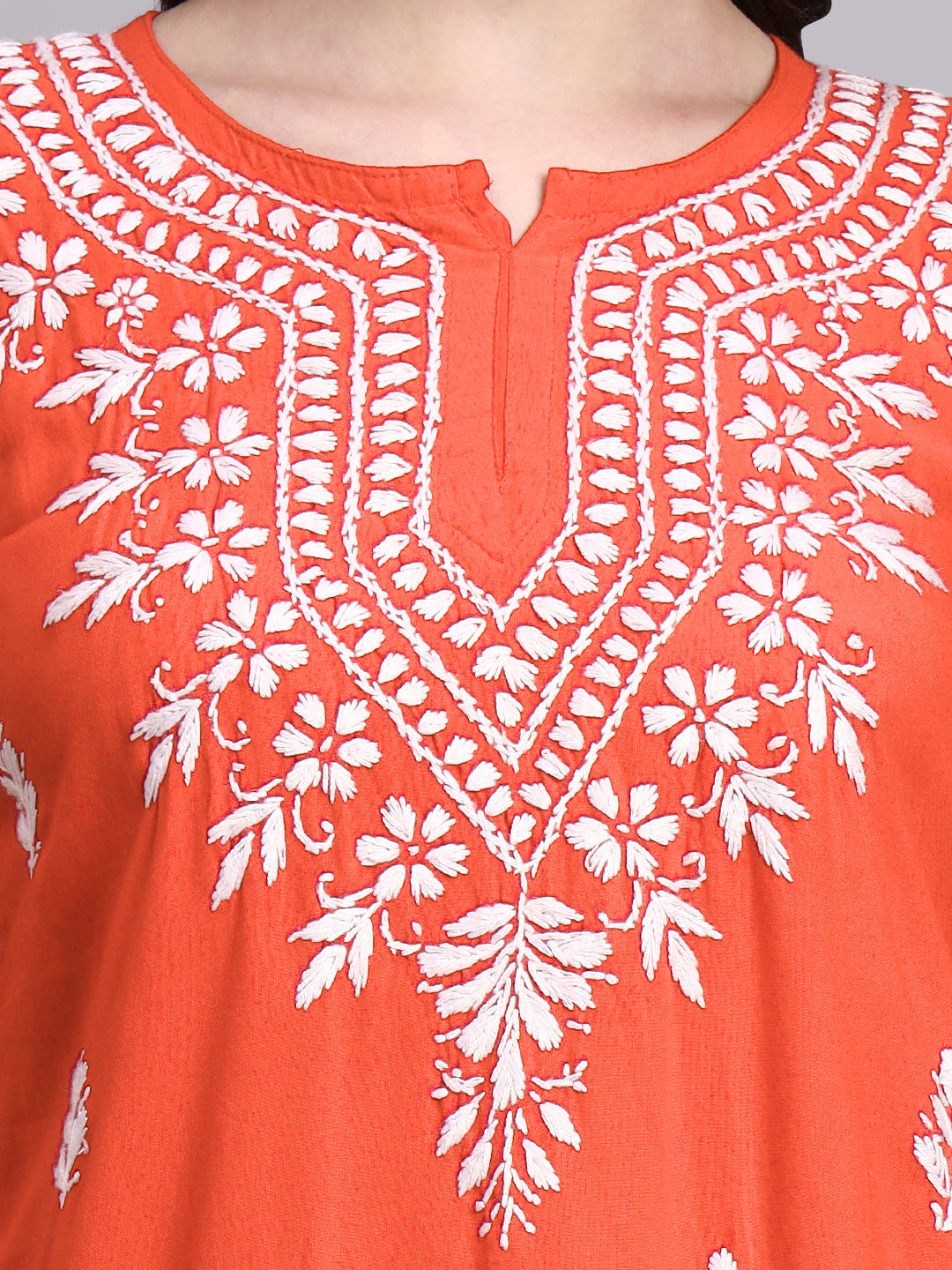Everyday wear rayon short kurta featuring delicate hand-embroidered chikankari motifs