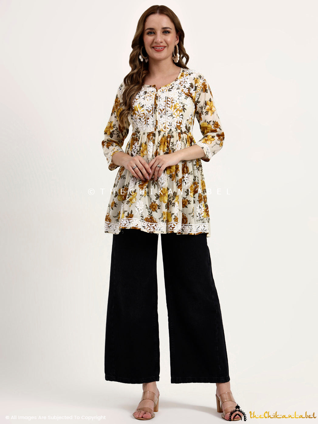 Artisan-crafted Mulmul Cotton Chikankari Short Top with premium printed fabric and flowy, relaxed silhouette for casual styling.