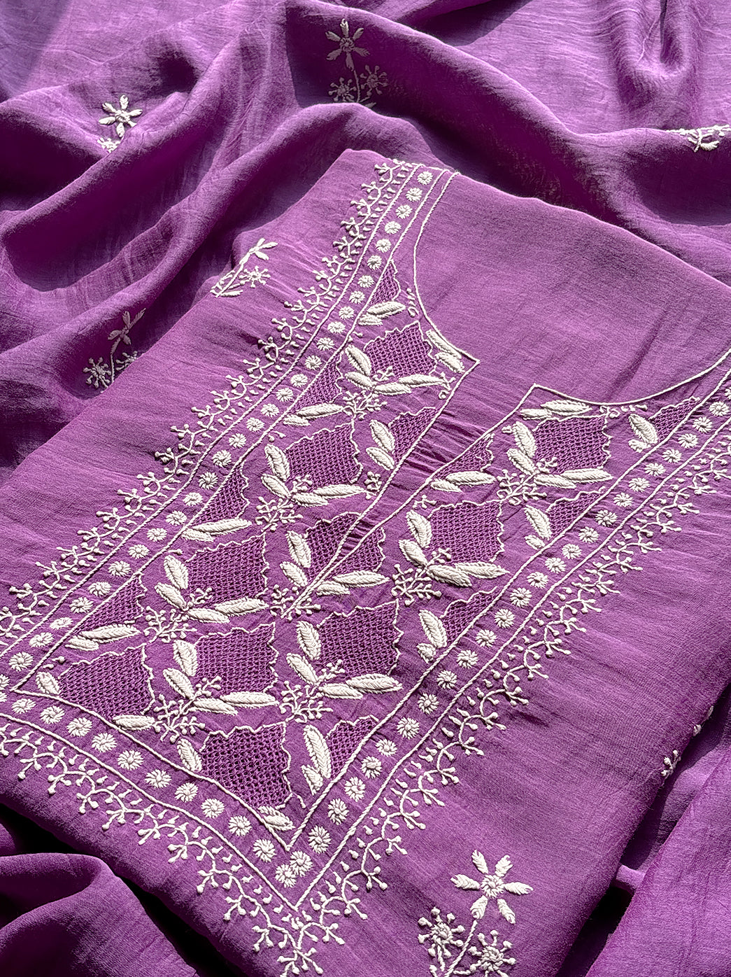 “Close-up of artisan hand embroidery on mulmul unstitched chikankari kurti piece with matching dupatta”