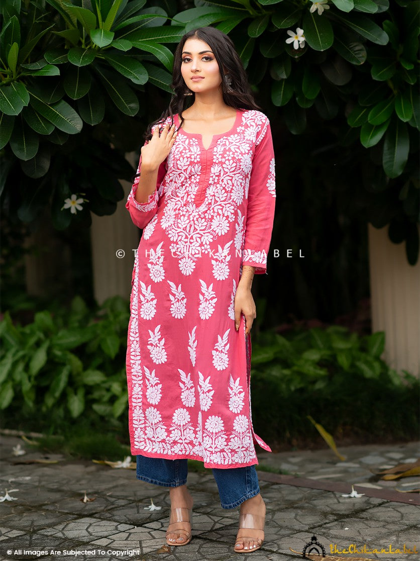 Front view of peach modal Chikankari kurti with white floral embroidery