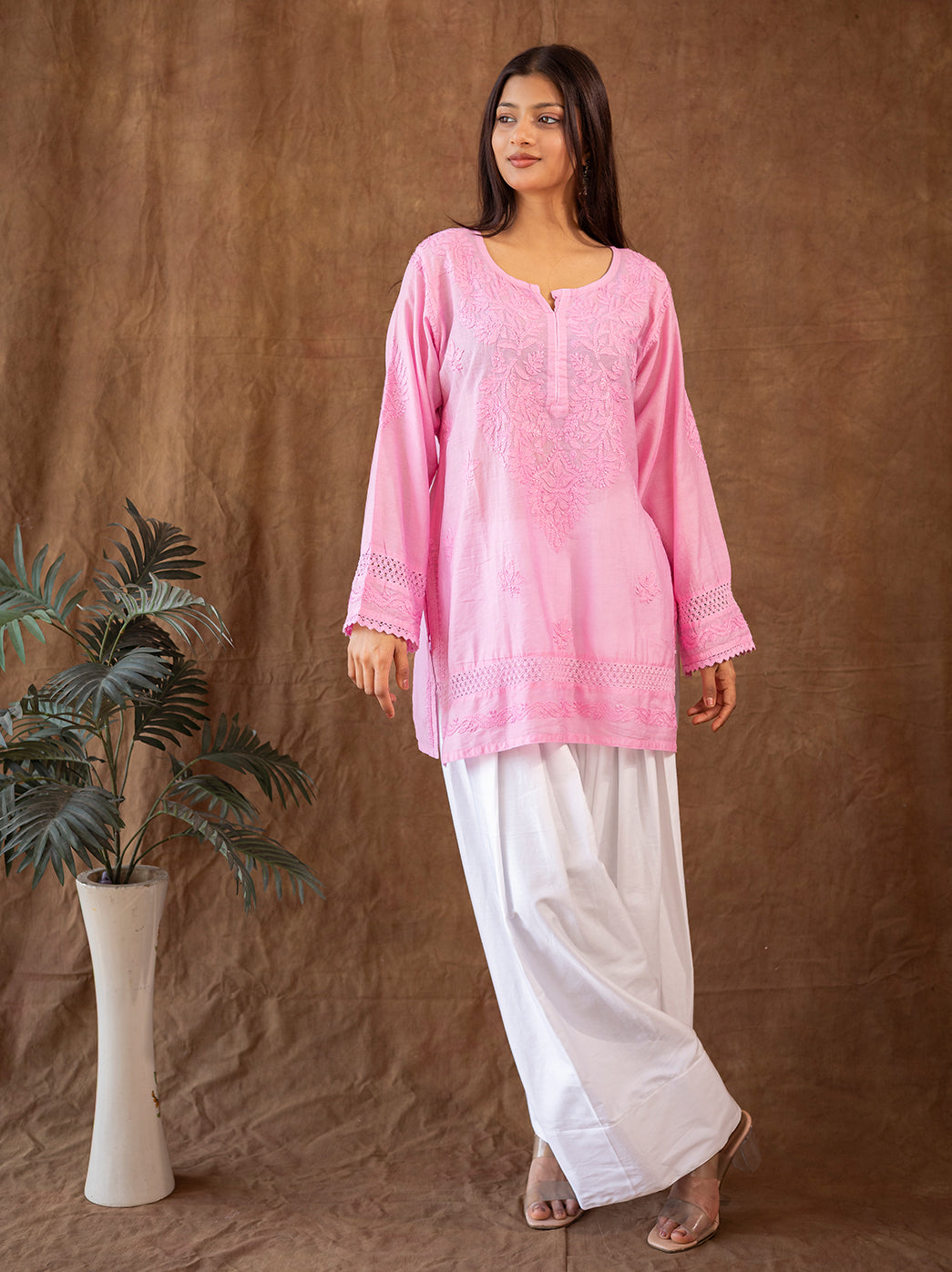 Chanderi chikankari kurti paired with traditional farshi salwar, featuring delicate hand embroidered floral motifs and an elegant ethnic silhouette