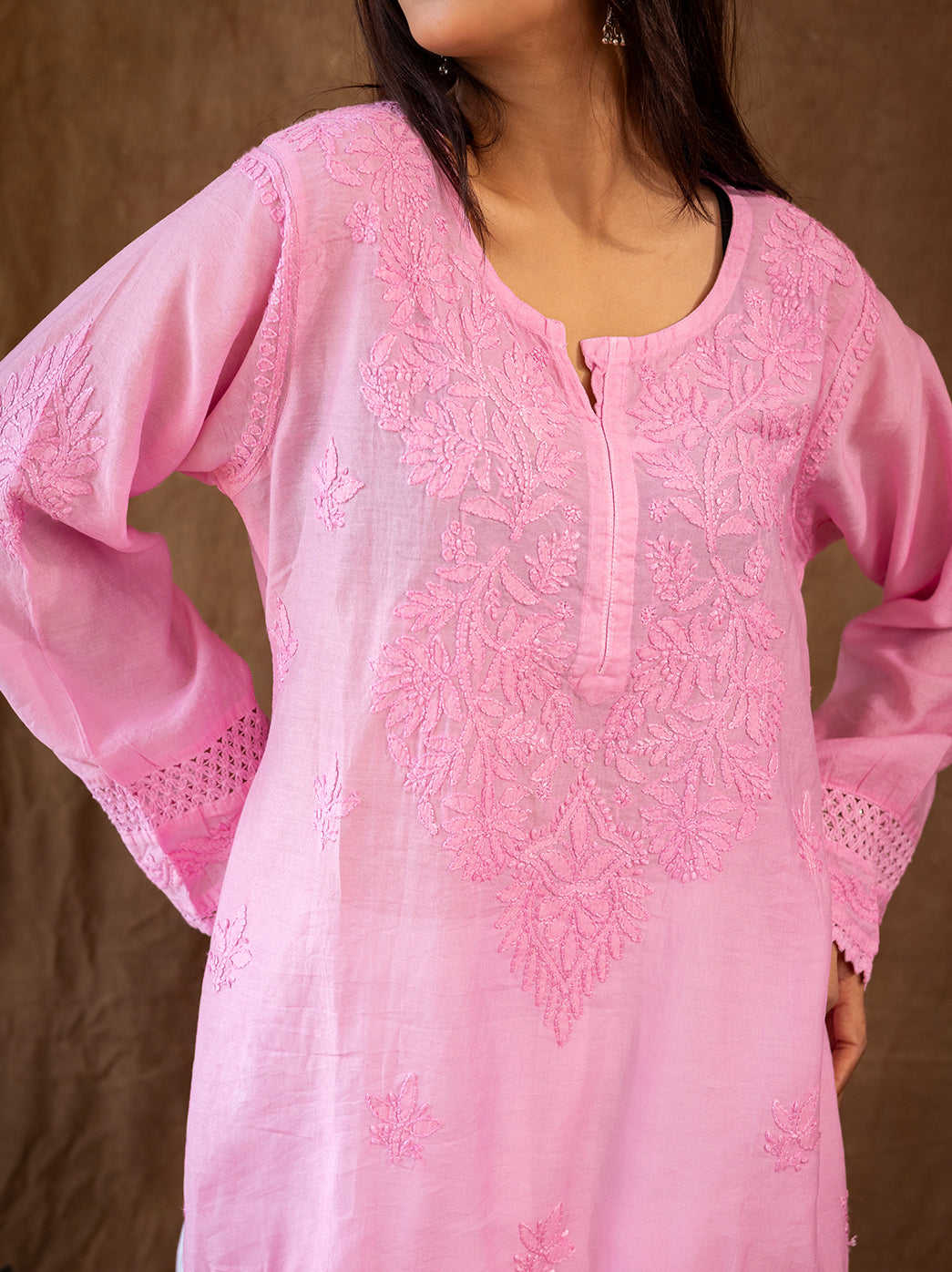 Traditional chikankari kurti with detailed floral embroidery, matched with relaxed fit farshi salwar for effortless ethnic elegance