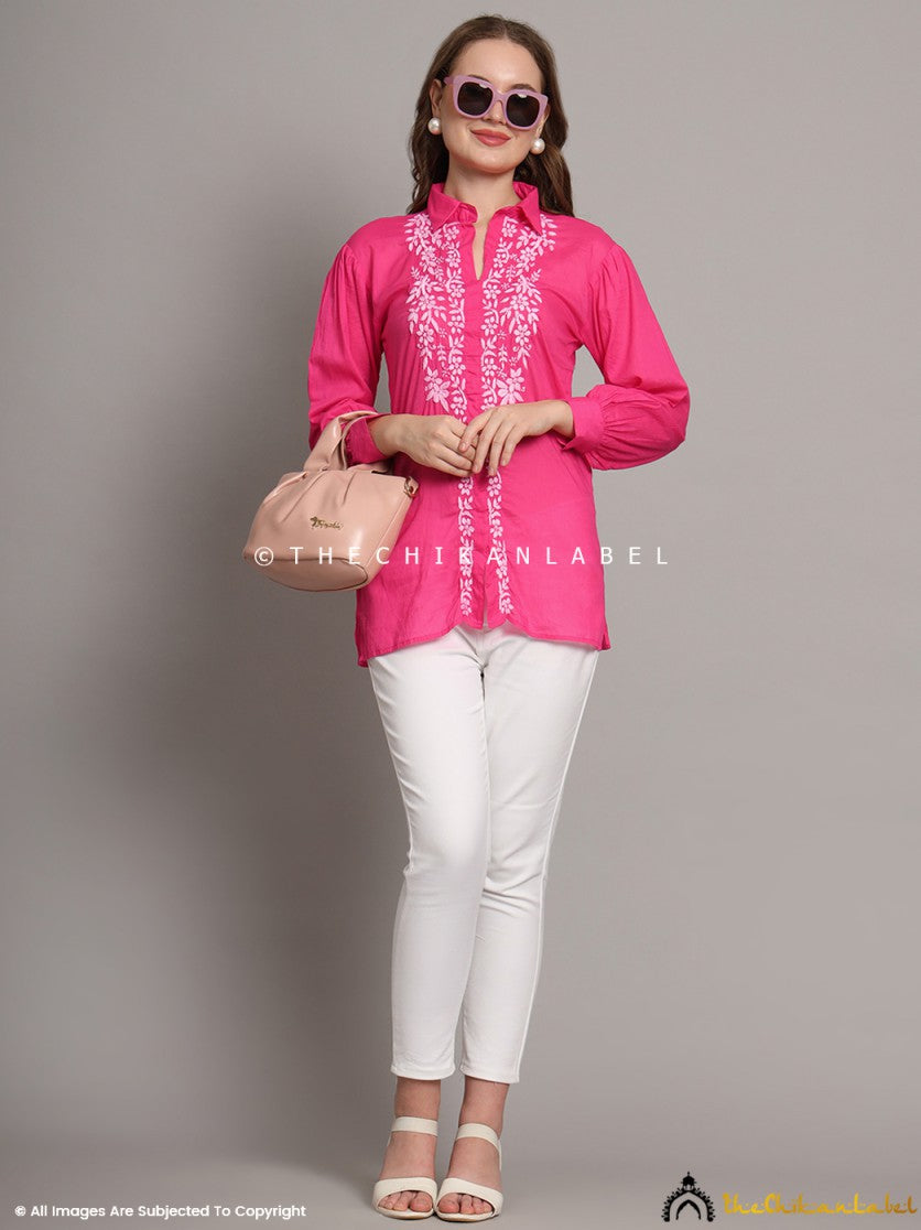 Woman wearing pastel pink chikankari shirt in mulmul cotton