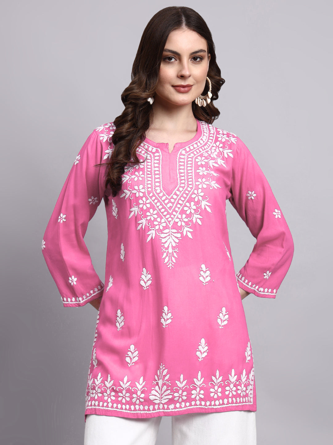Handmade chikankari short kurta crafted in soft rayon fabric with intricate floral embroidery on neckline and hem for everyday ethnic wear