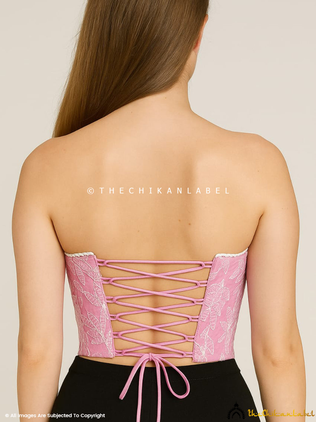 Women’s georgette corset blouse featuring traditional Lucknowi embroidery work.