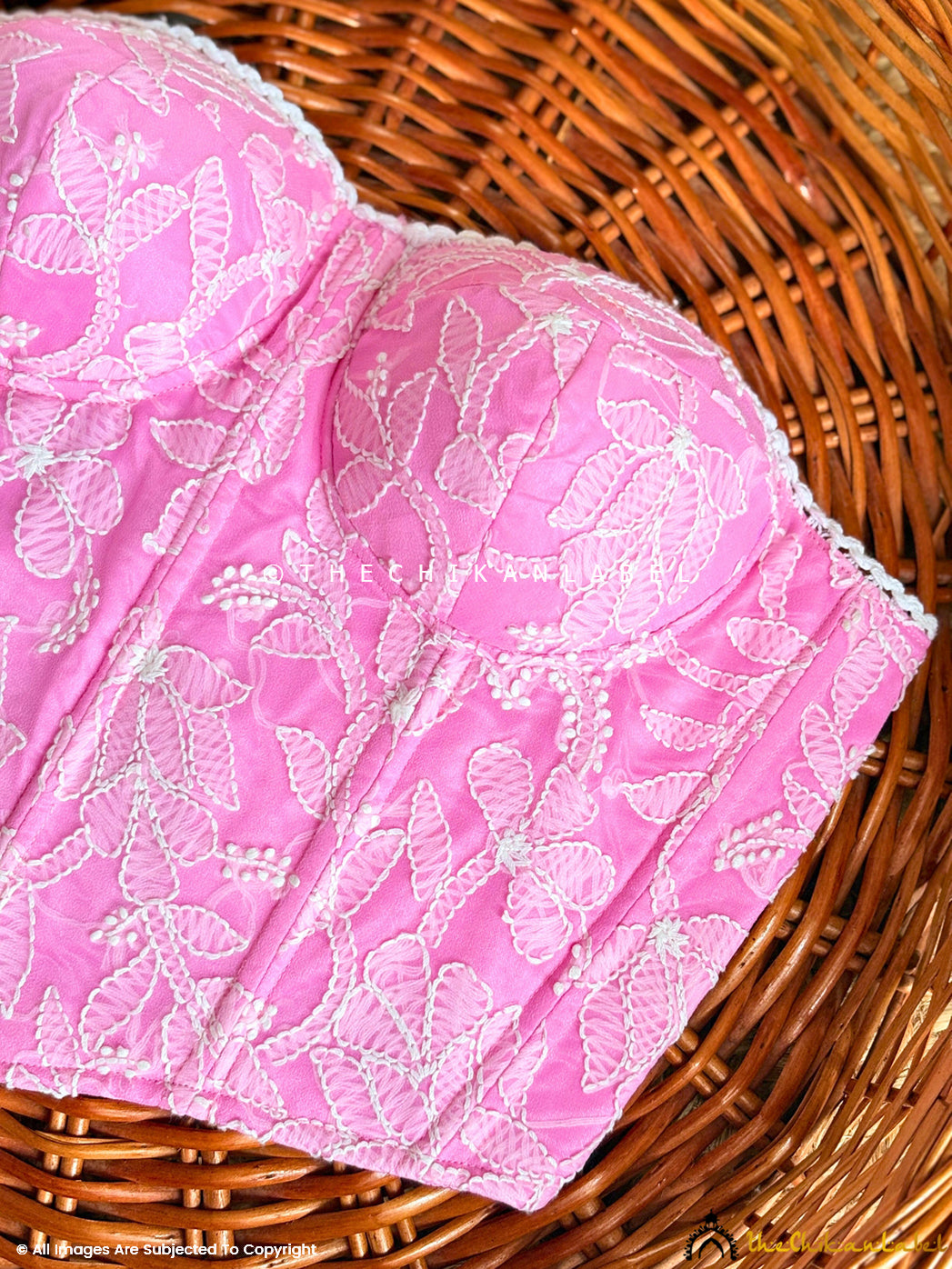 Chikankari corset bustier with sweetheart neckline and detailed hand embroidery.