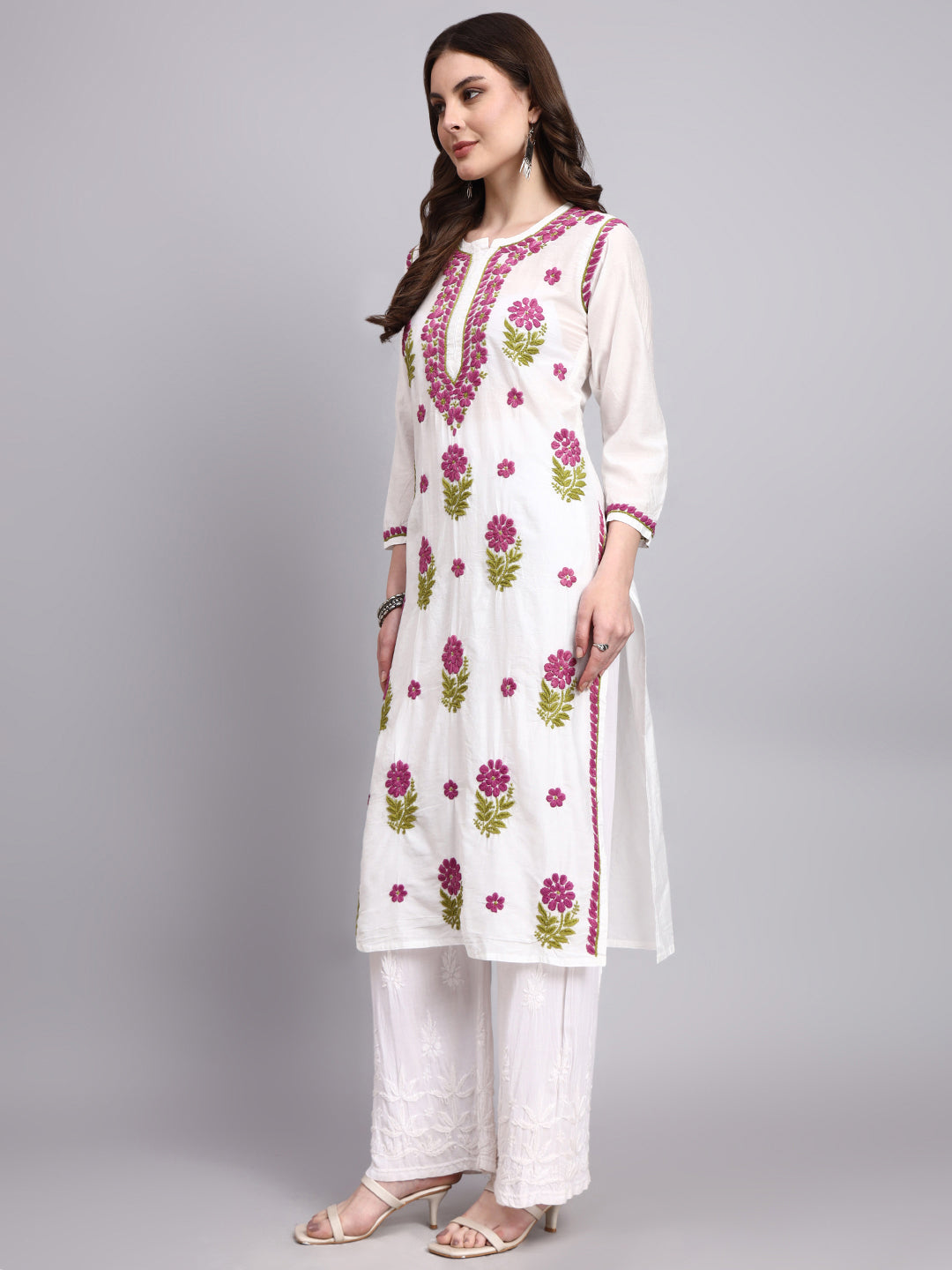 Handcrafted chikankari straight long kurta showcasing floral embroidery patterns inspired by Indian craftsmanship