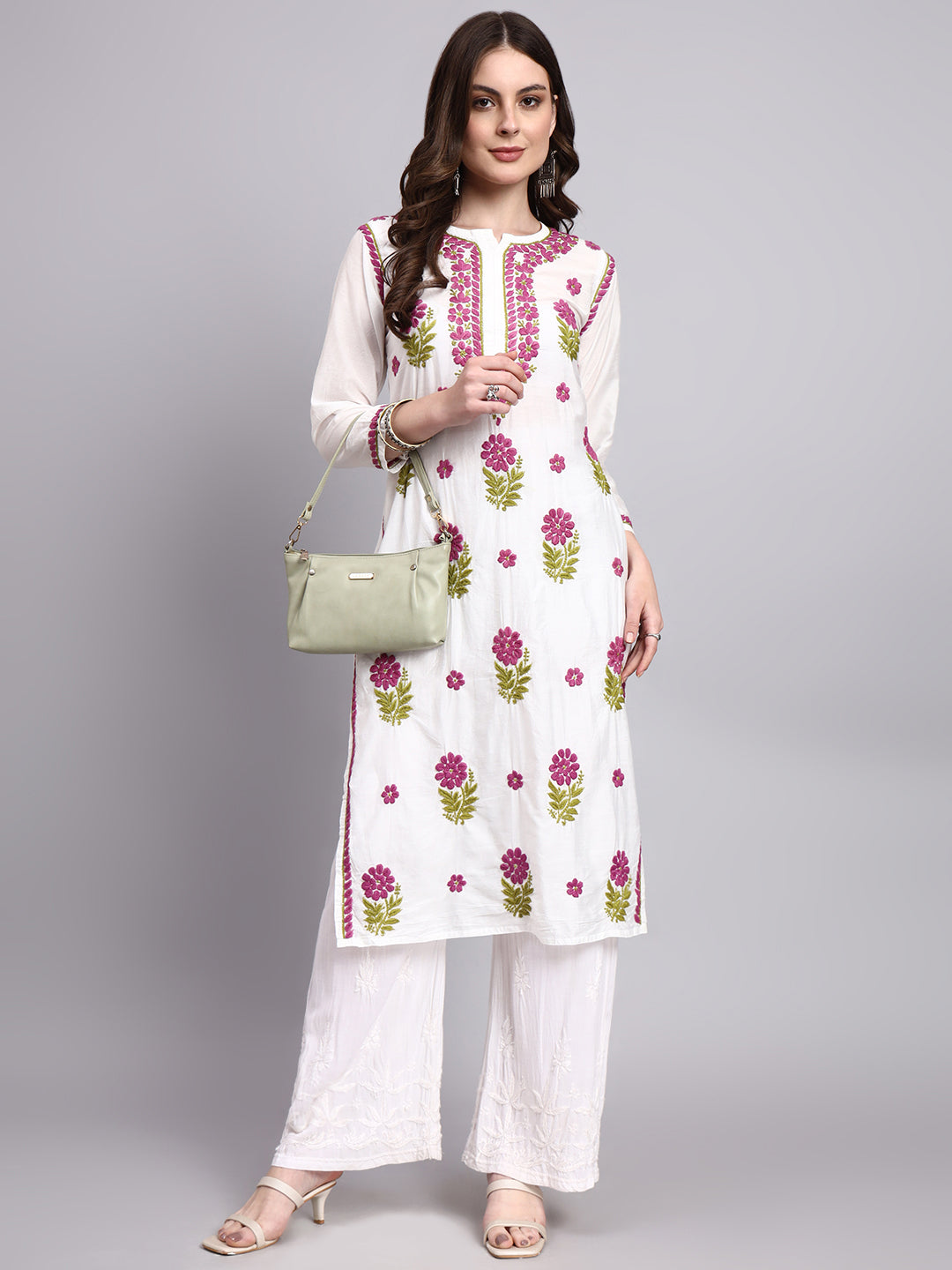 Elegant handmade chikankari straight kurta featuring detailed embroidery on sleeves, borders, and hemline