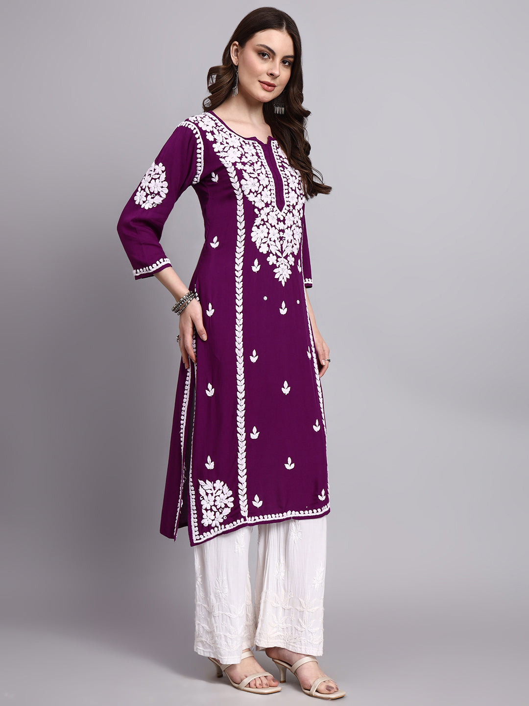 Classic chikankari long kurta crafted by skilled artisans featuring traditional embroidery and modern straight silhouette