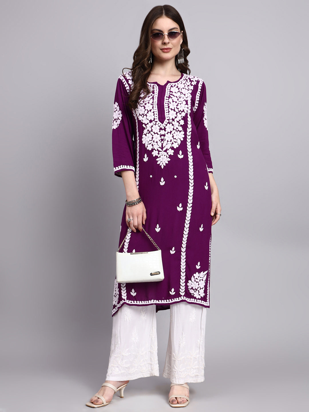 Lightweight rayon chikankari long kurti styled for fusion and ethnic occasions with detailed hand embroidery