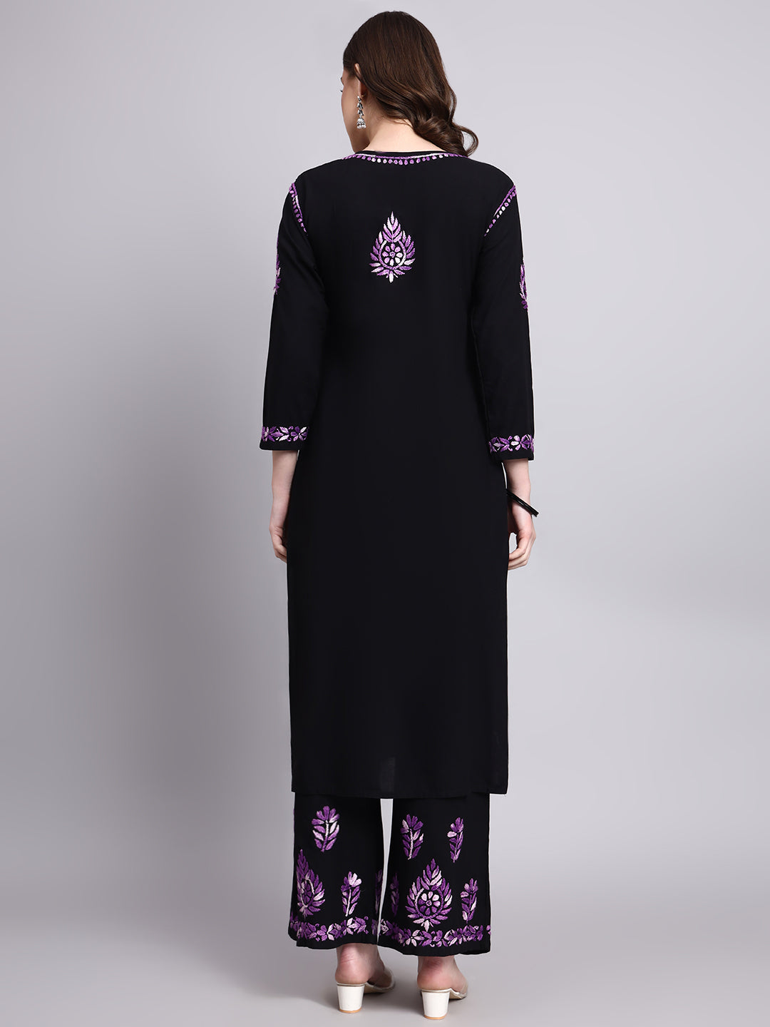 Elegant women’s ethnic wear set showcasing rayon chikankari kurta palazzo set with detailed floral embroidery