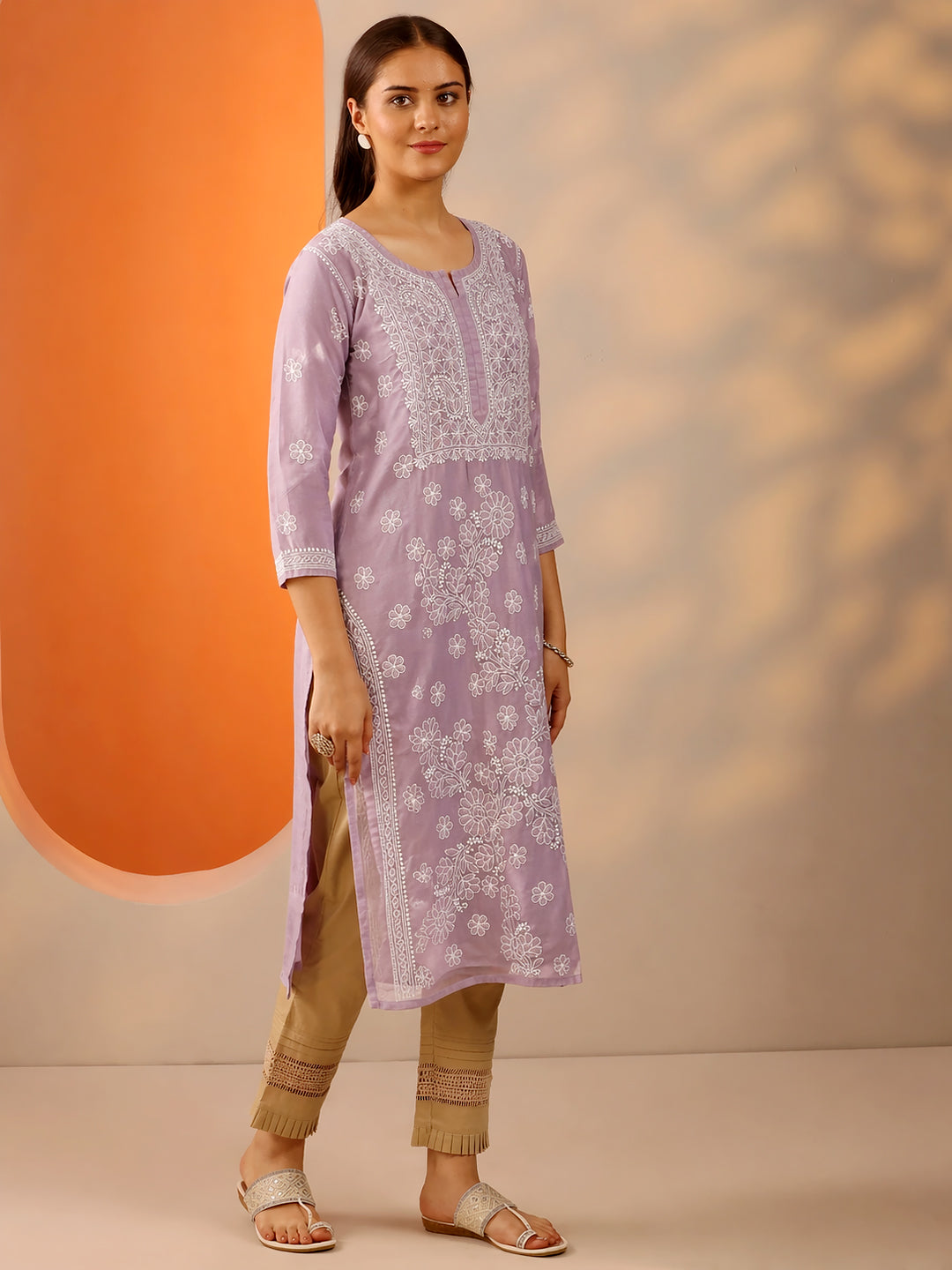 Comfortable regular wear kurti with straight silhouette and delicate chikankari embroidery for modern women