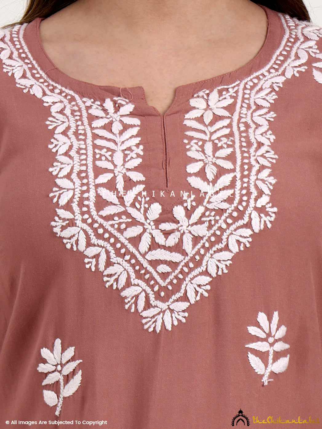Comfortable rayon chikankari embroidered top for everyday fashion and outings.