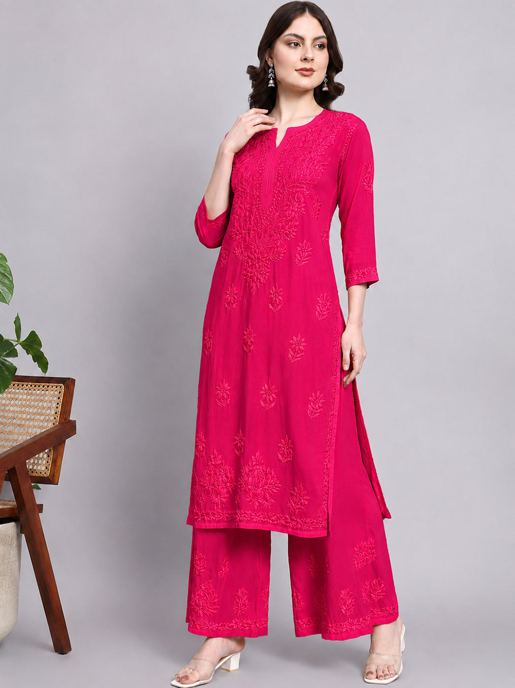 Trending chikankari kurti palazzo set for women featuring floral embroidery, straight silhouette and comfortable three quarter sleeve design.