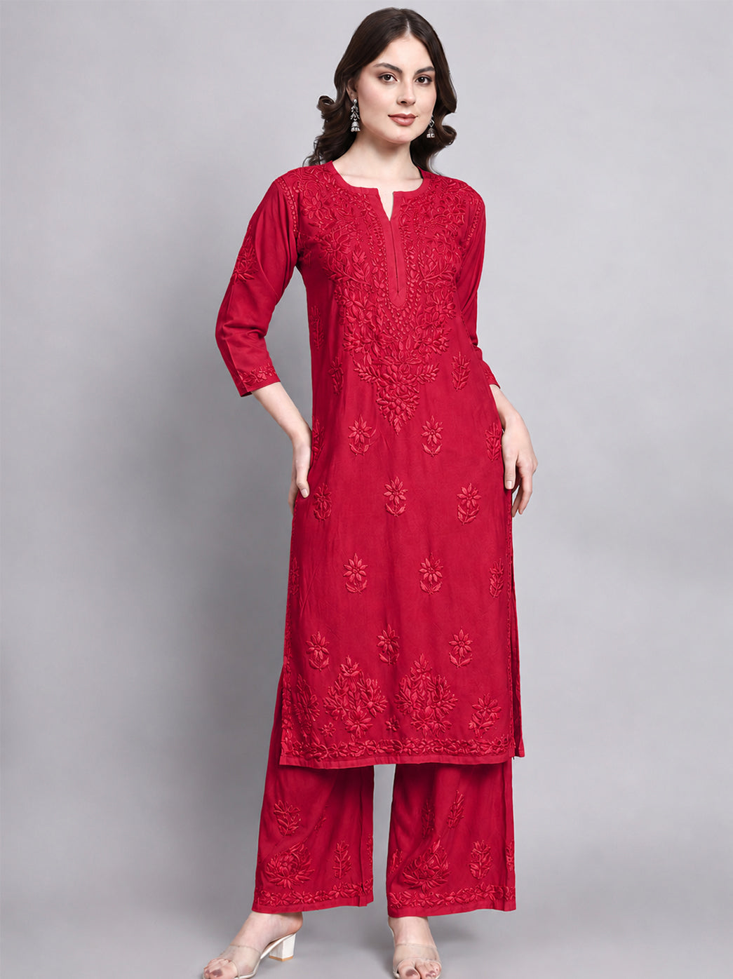 Rayon kurti palazzo set for women showcasing intricate chikankari style embroidery with a straight cut kurti and relaxed wide leg ethnic bottoms.