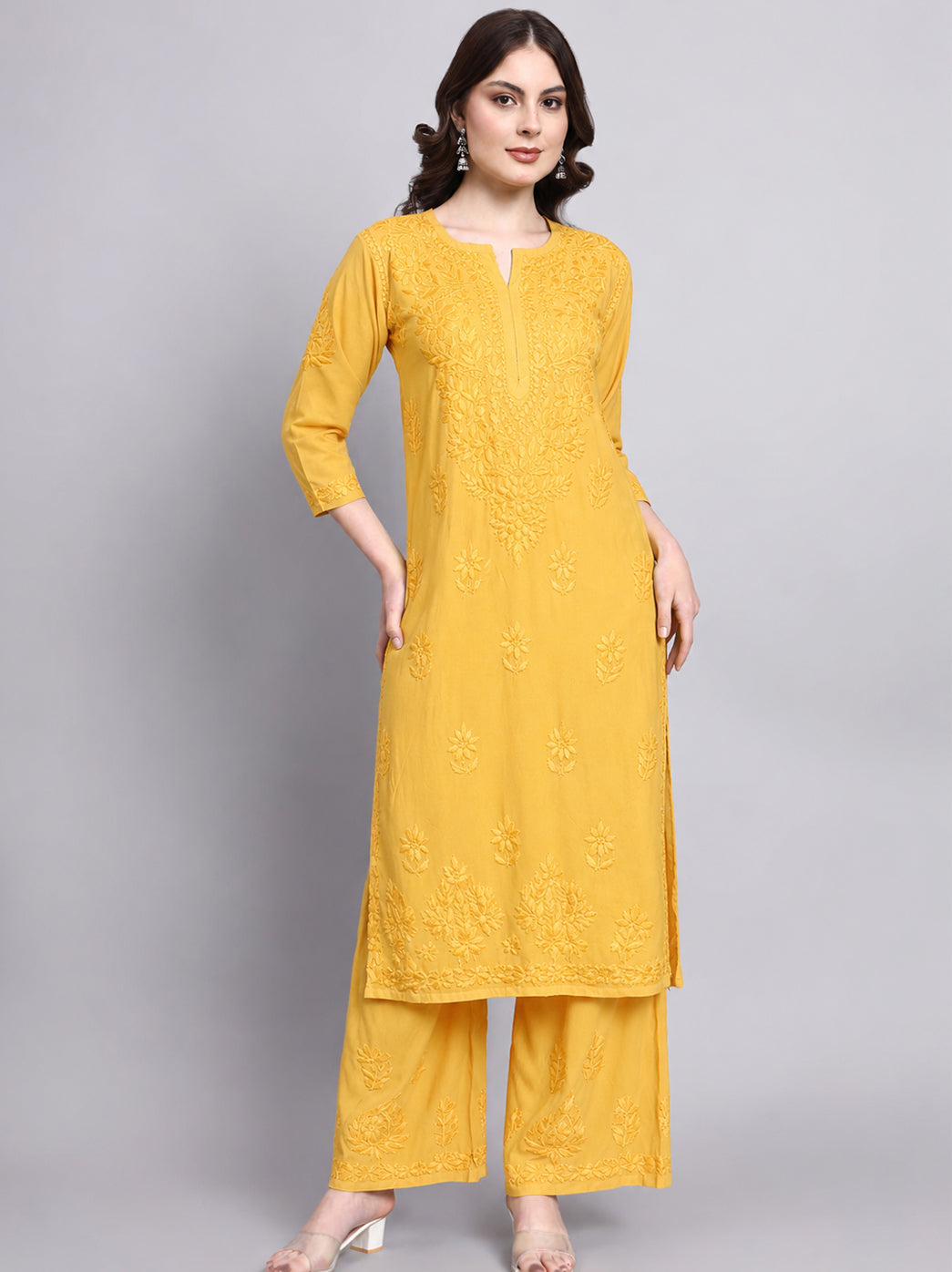 Women’s rayon chikankari kurta set featuring a straight embroidered kurti with matching palazzo for elegant ethnic and everyday styling.