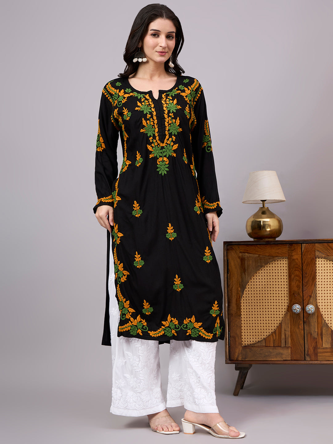 Comfortable regular wear Rayon Straight Kurti with authentic handcrafted Chikankari embroidery, traditional craftsmanship, and modern ethnic fashion suitable for every season.
