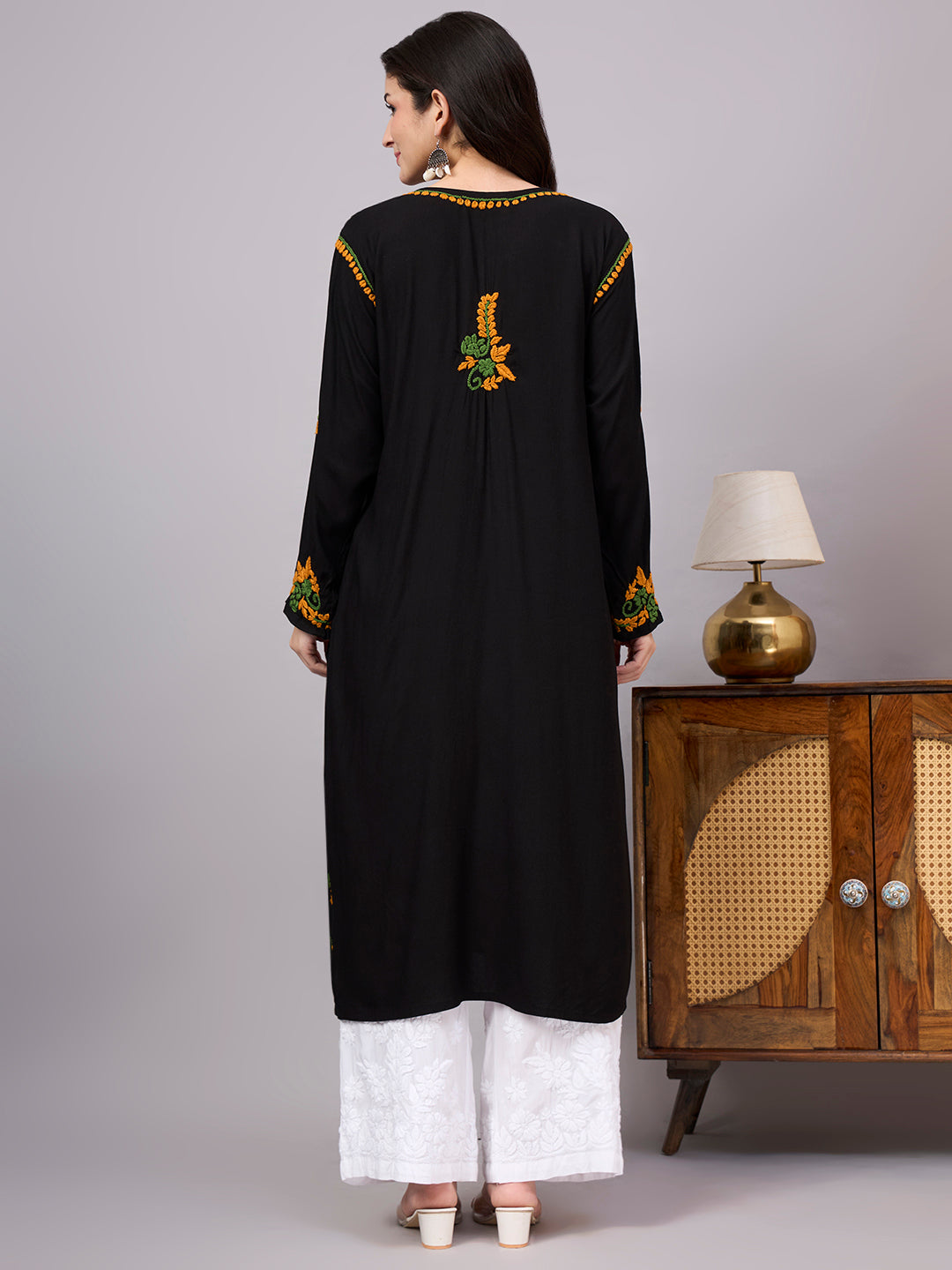 Premium ethnic Rayon Straight Kurti with handcrafted floral Chikankari embroidery, lightweight fabric, and comfortable design ideal for daily wear and special occasions.