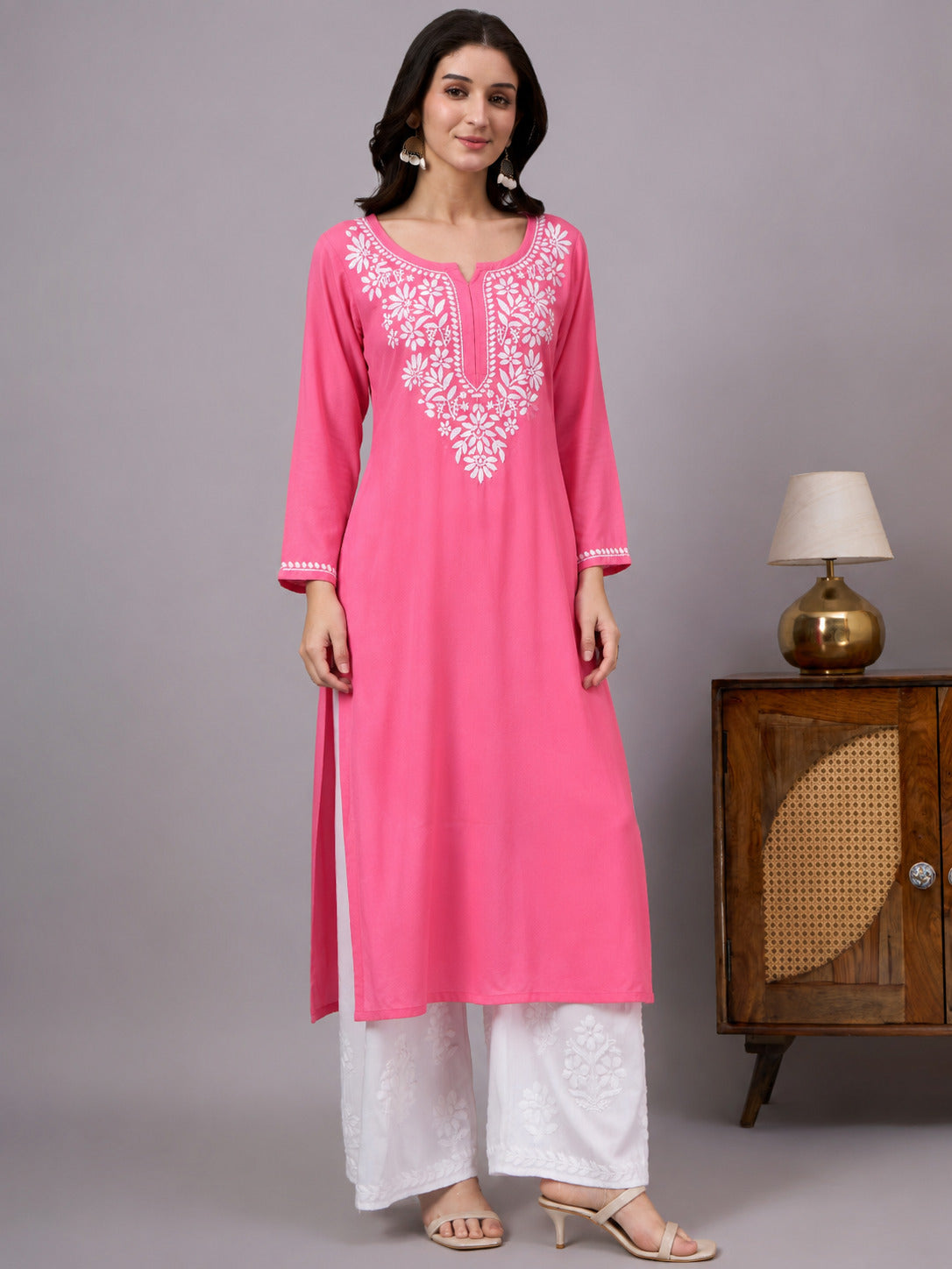 Elegant Chikankari straight kurta for women crafted from soft rayon fabric with intricate floral embroidery, offering all-day comfort and a sophisticated traditional look.