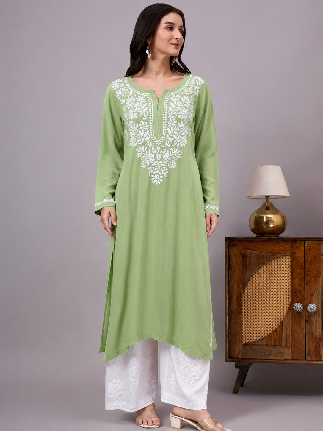 Premium Ranya Rayon Straight Kurti with beautifully embroidered Chikankari detailing on the neckline and sleeves, designed for comfortable regular wear and timeless ethnic style.