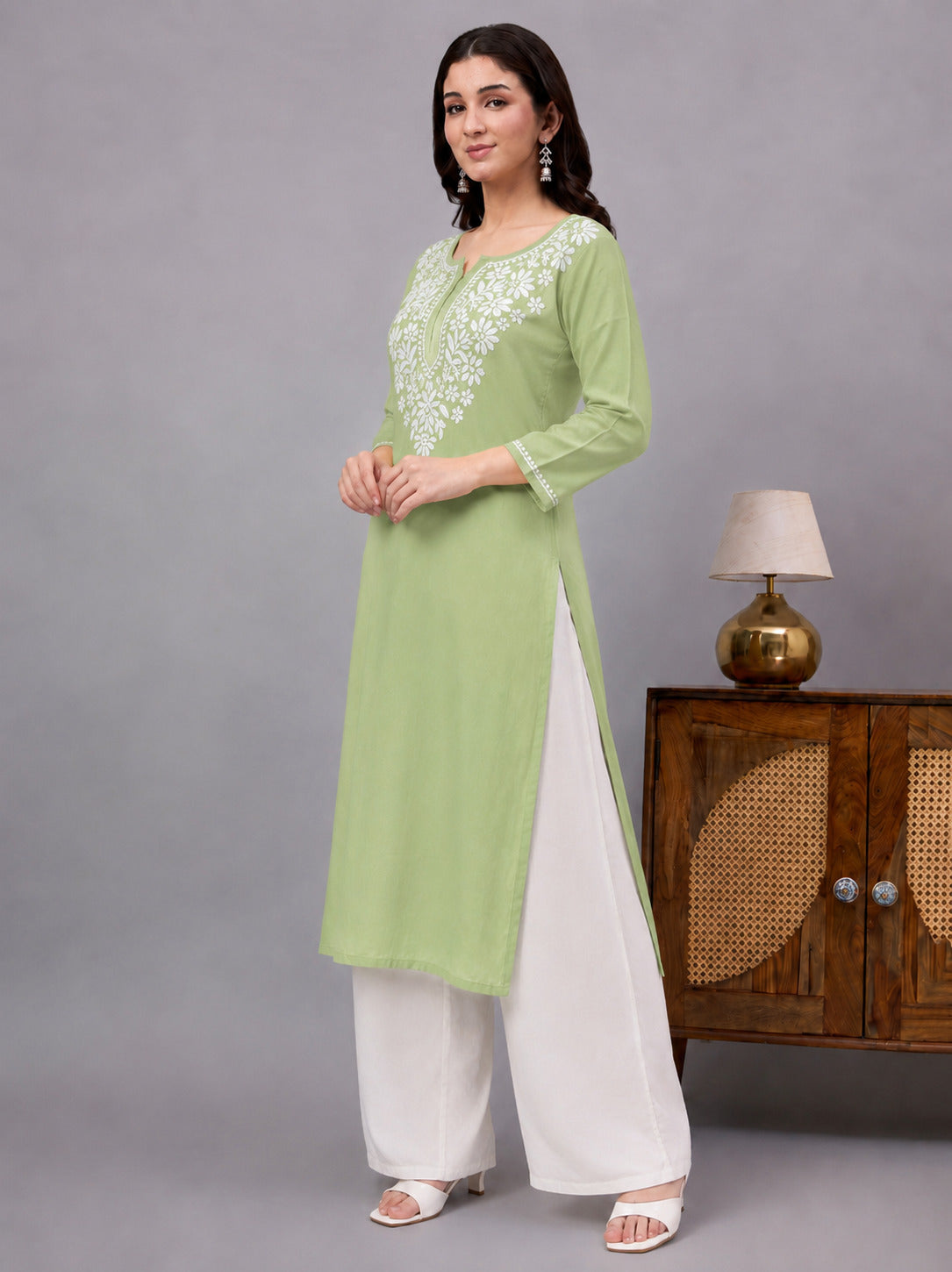Women's straight-fit rayon kurti with authentic Lucknowi Chikankari embroidery, ideal for office wear, festive gatherings, daily wear, and modern ethnic wardrobes.