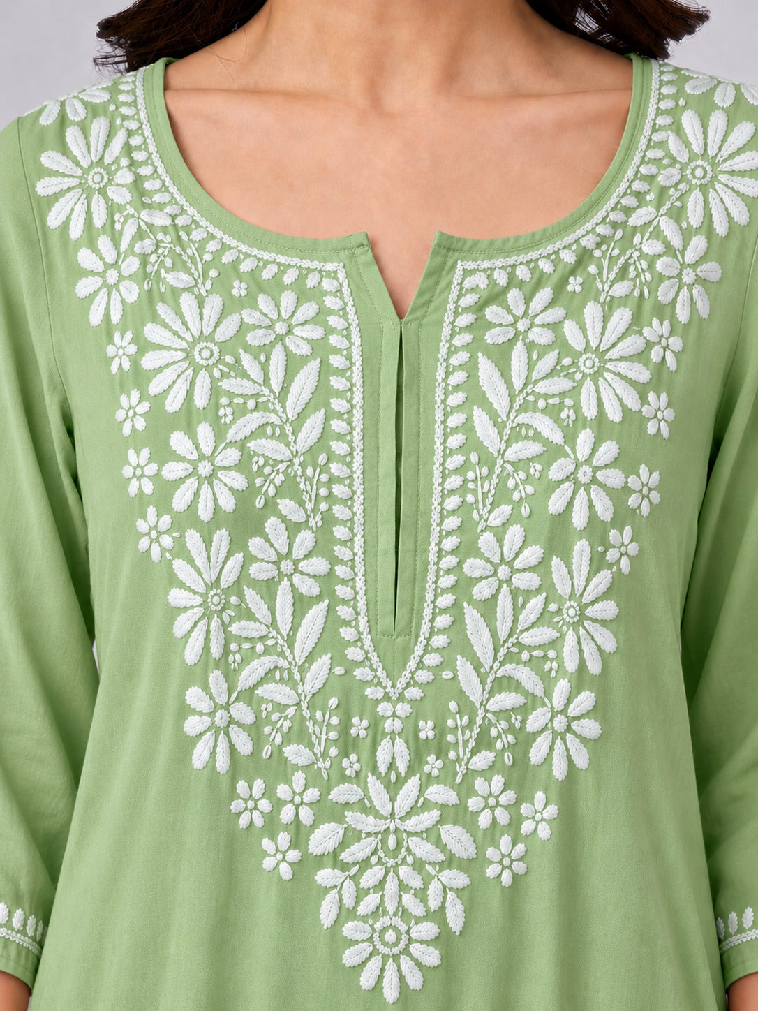 Elegant Chikankari straight kurta for women crafted from soft rayon fabric with intricate floral embroidery, offering all-day comfort and a sophisticated traditional look.