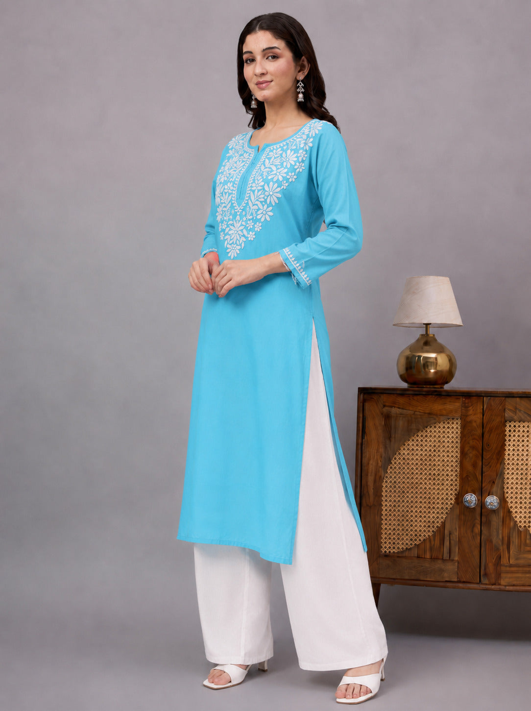 Elegant Ranya Rayon Straight Kurti combining authentic Chikankari embroidery, breathable rayon fabric, and a classic straight-cut design for comfortable regular wear and contemporary ethnic fashion.