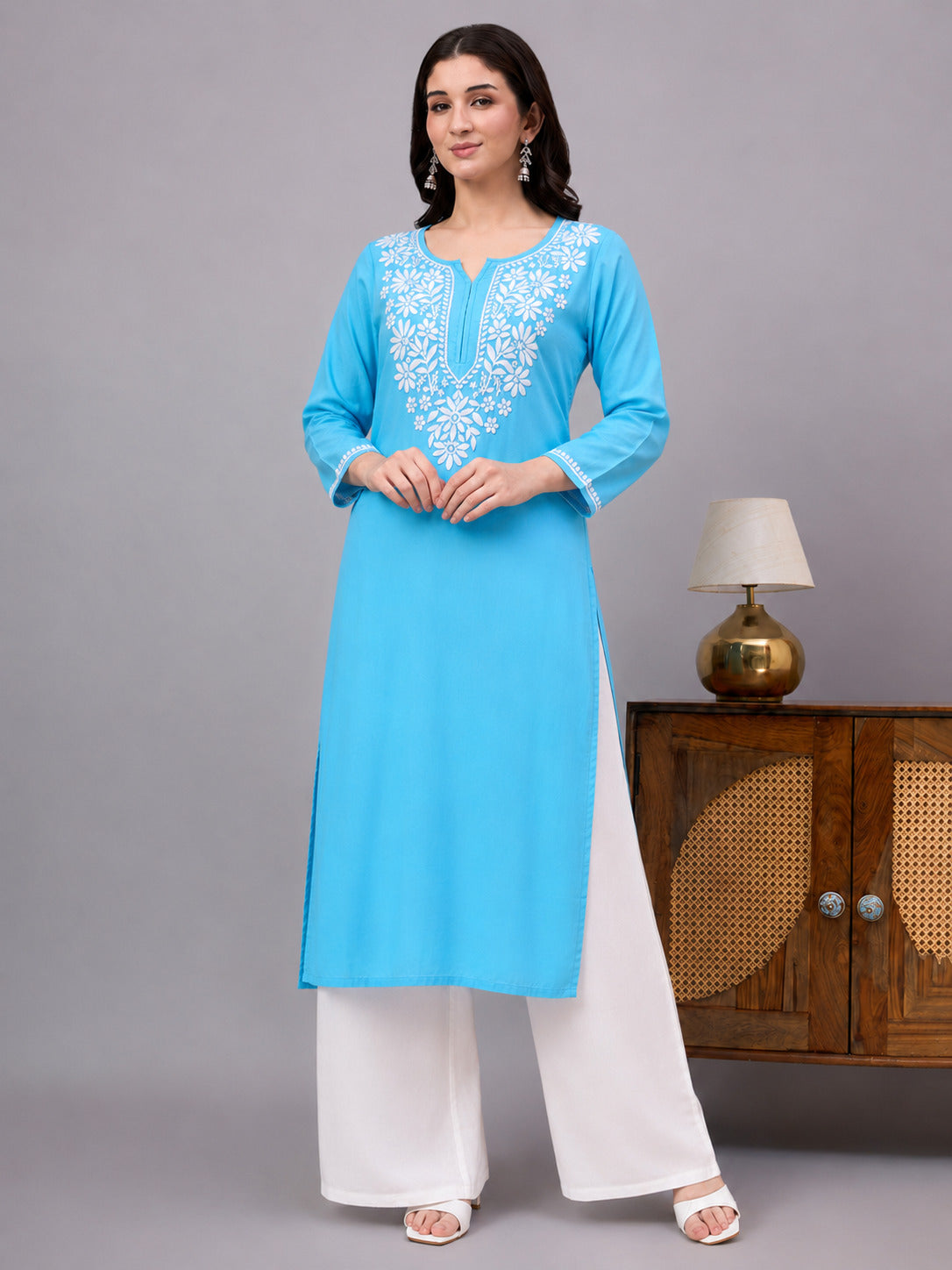 Premium Ranya Rayon Straight Kurti with beautifully embroidered Chikankari detailing on the neckline and sleeves, designed for comfortable regular wear and timeless ethnic style.