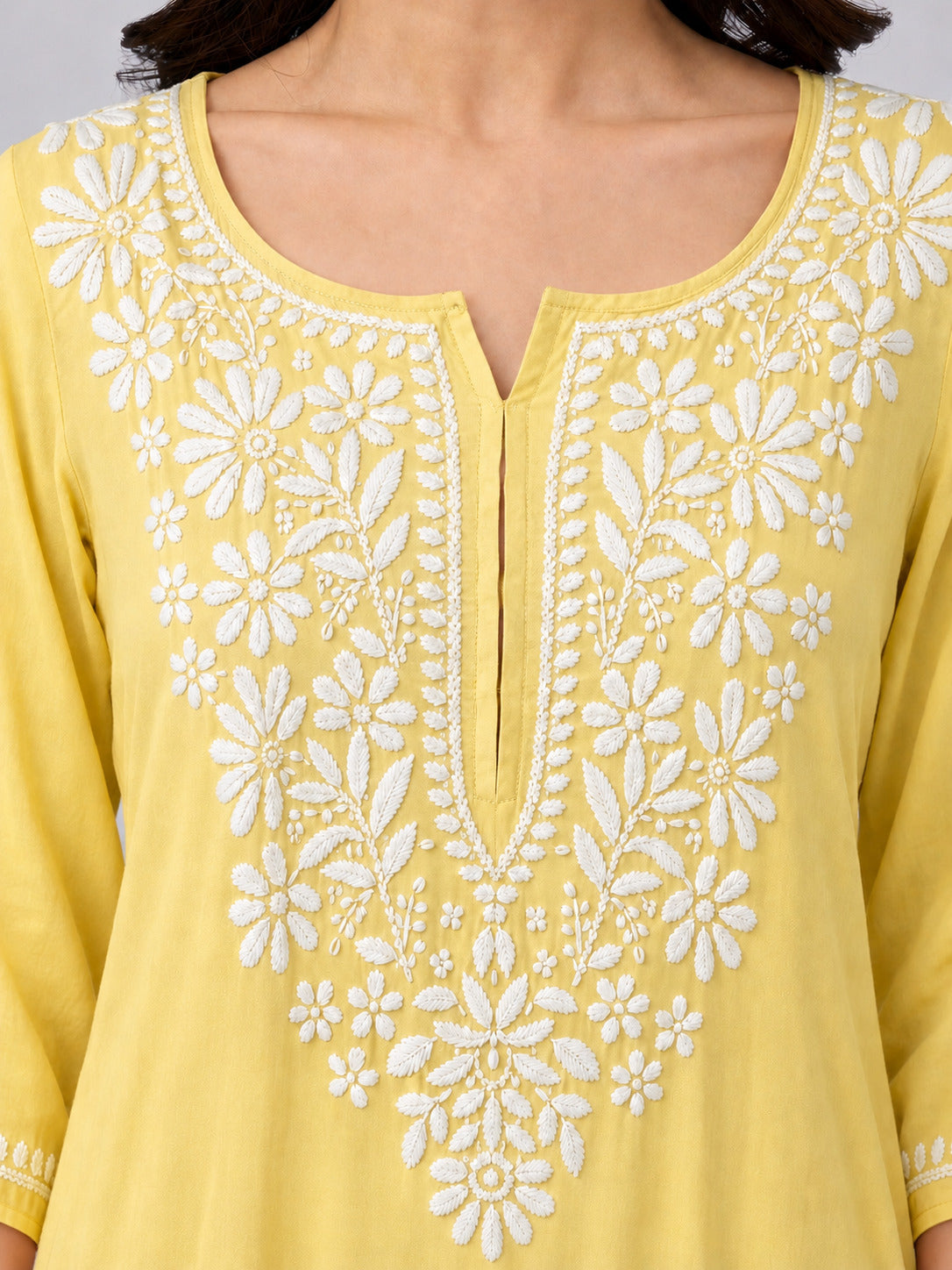 Premium Ranya Rayon Straight Kurti with beautifully embroidered Chikankari detailing on the neckline and sleeves, designed for comfortable regular wear and timeless ethnic style.