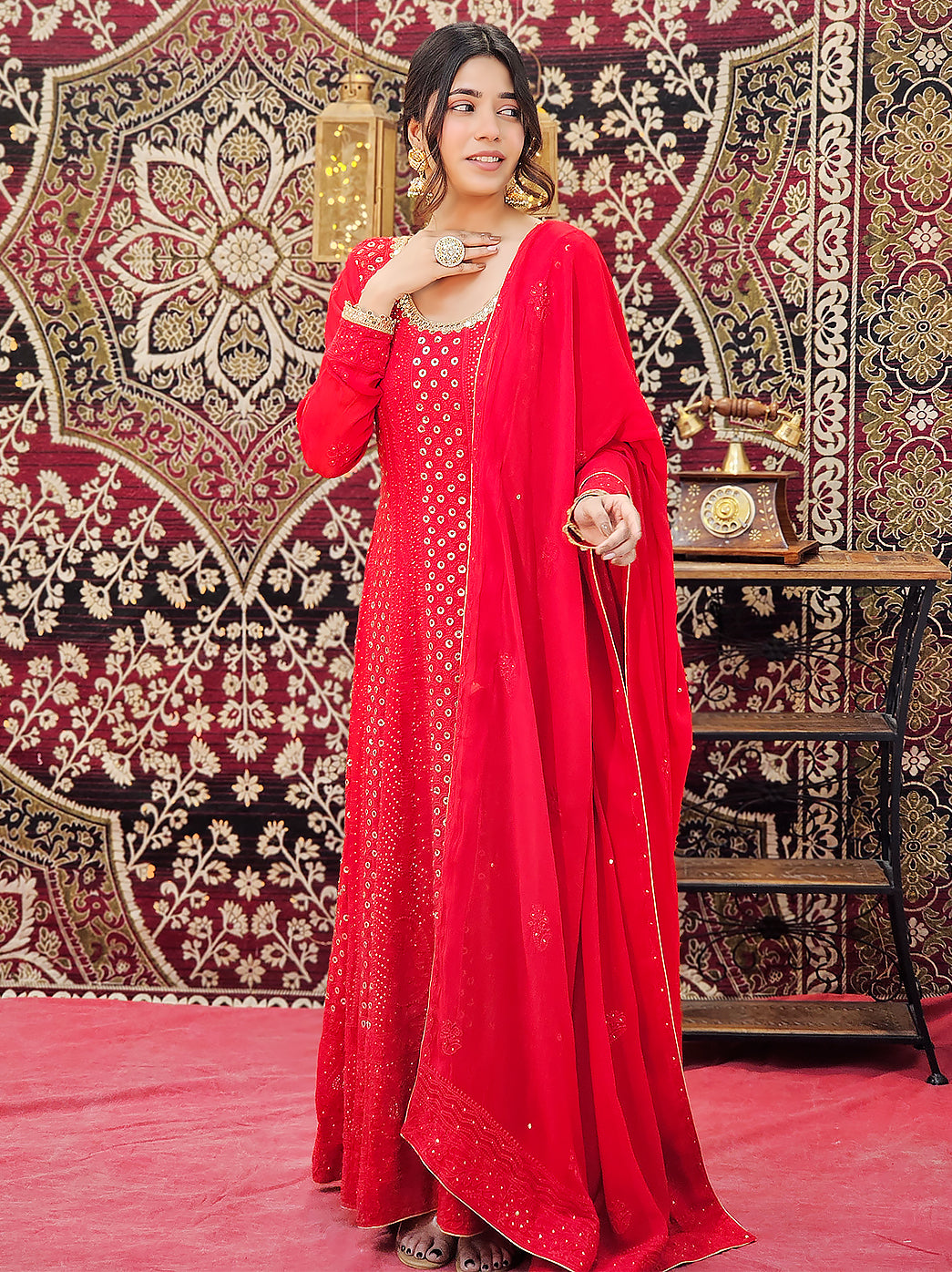 Elegant chikankari anarkali styled with ethnic jewelry and heels, showcasing handcrafted floral embroidery