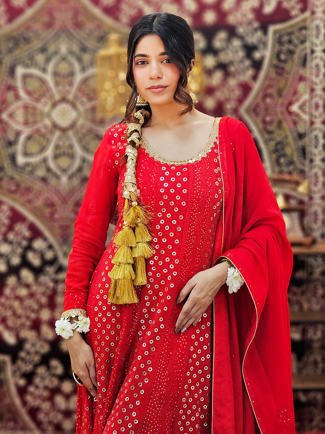 Handcrafted festive wear anarkali with mukaish embellishments, styled with traditional accessories for weddings