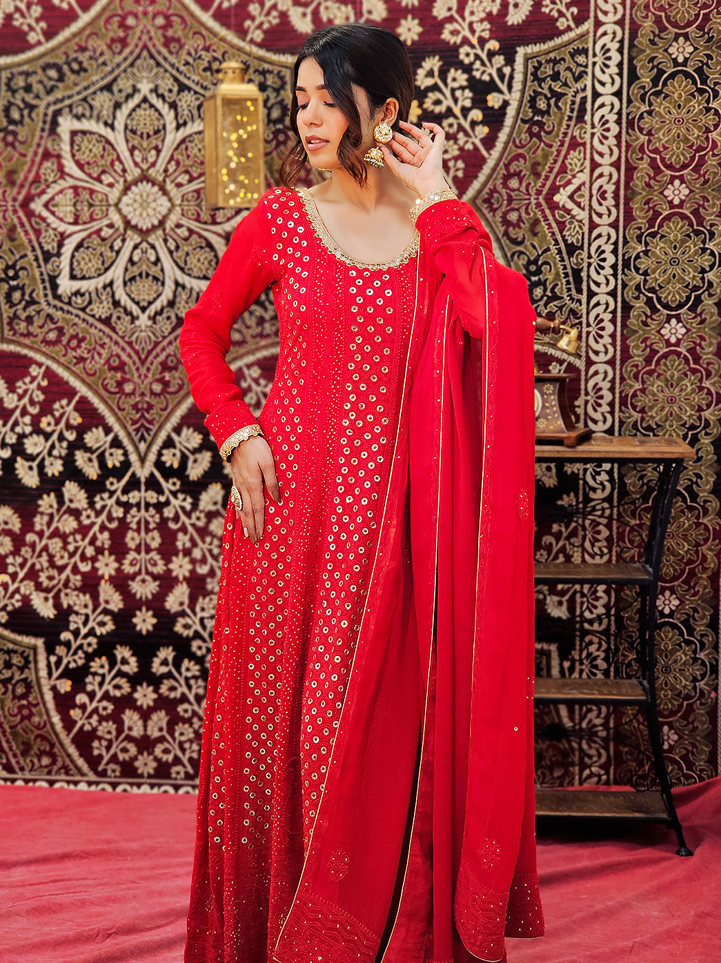 Side pose of model in luxe chikankari anarkali highlighting its structure and craftsmanship for festive styling