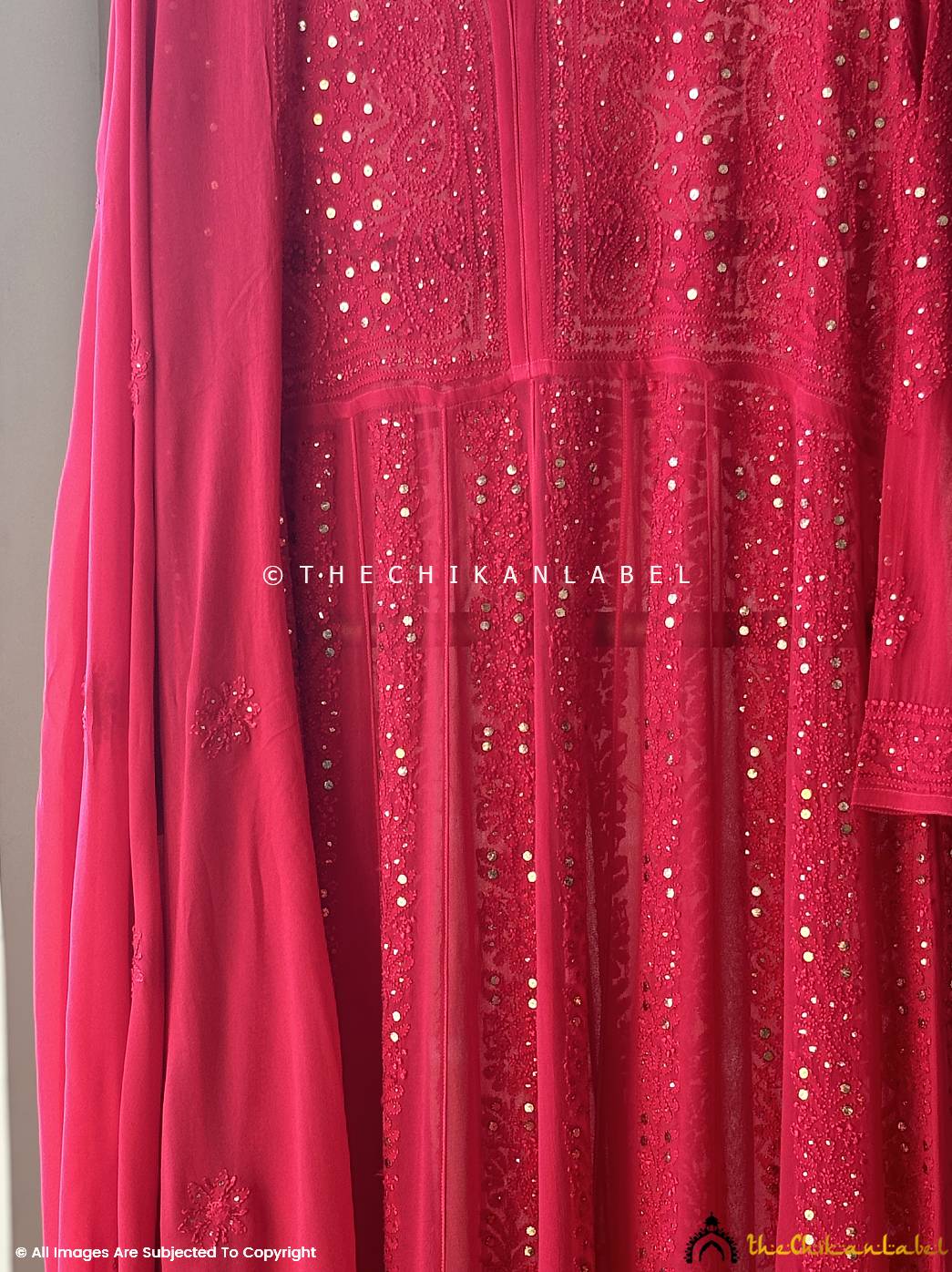 Intricately embroidered red georgette Anarkali with sequins