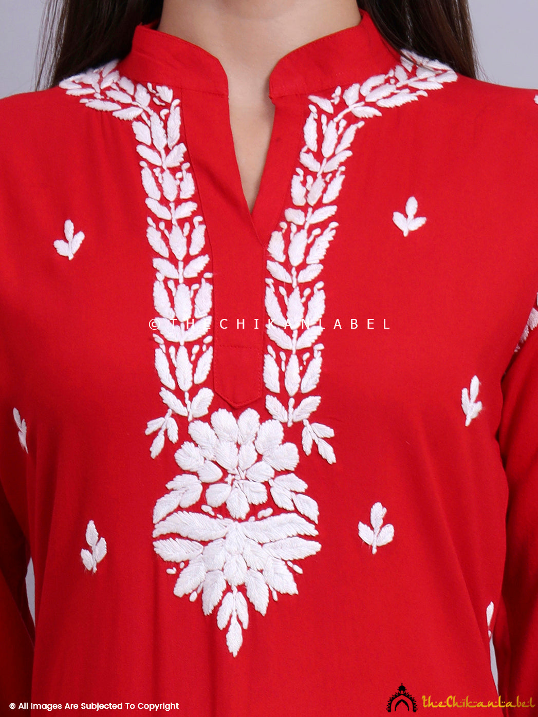 Designer rayon kurti with classic ethnic motifs and threadwork, ideal for cultural gatherings.