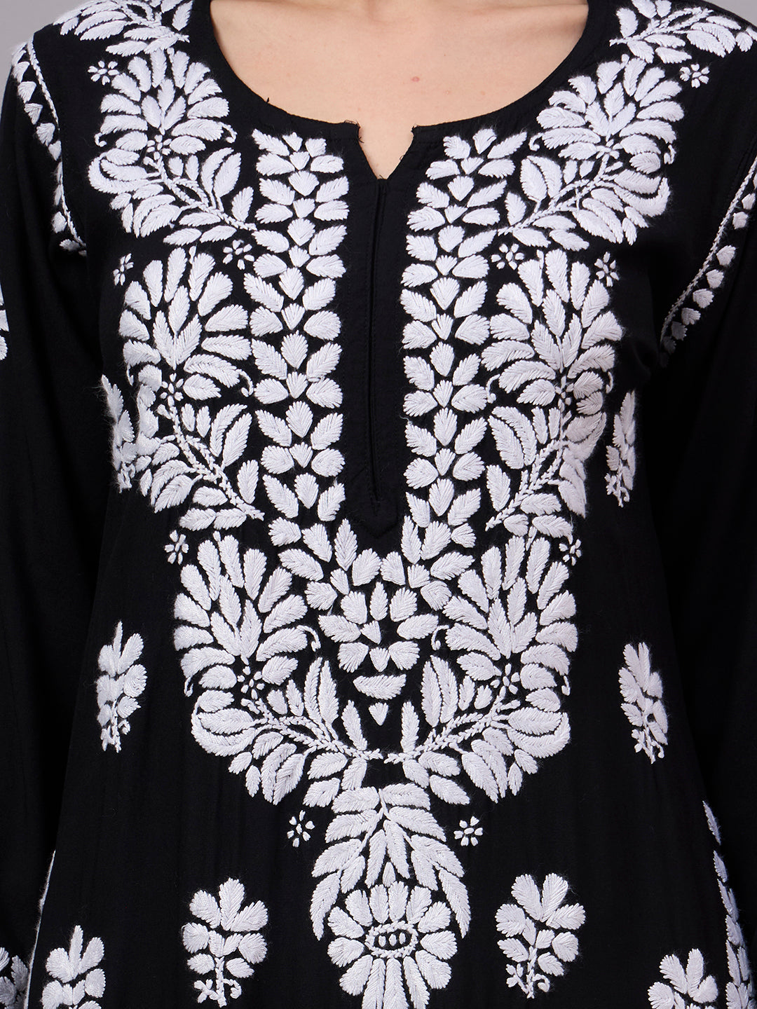 Premium Chikankari Kurta for women crafted from soft rayon fabric with intricate handcrafted embroidery, making it a comfortable regular wear kurti for office and casual outings.