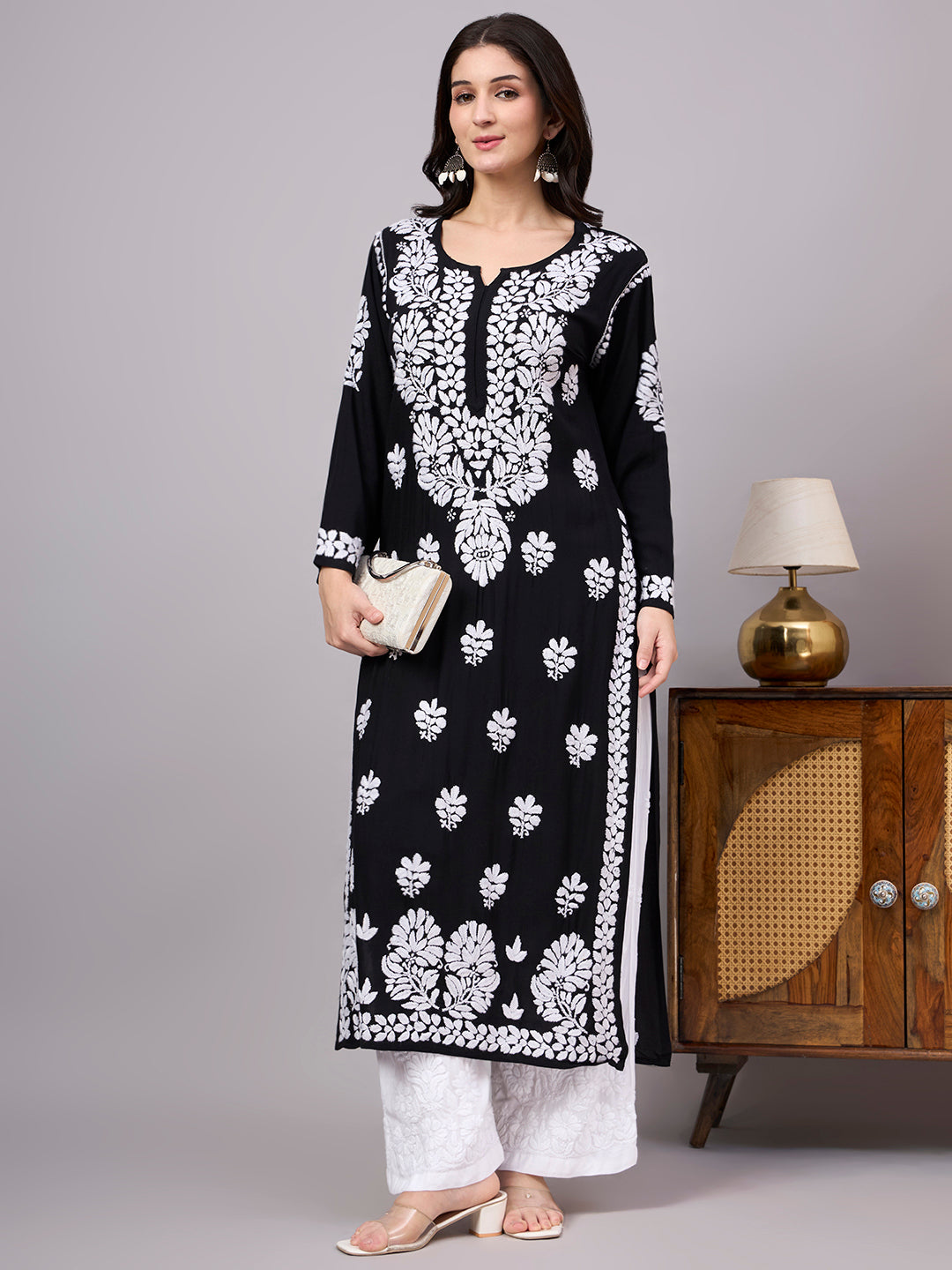 Women's ethnic Rayon Straight Kurti featuring traditional Lucknow Chikankari craftsmanship, soft fabric, full sleeves, and graceful straight-cut design for effortless elegance.