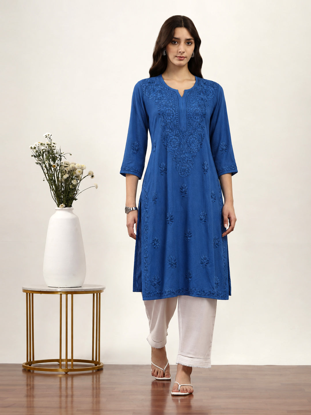 Saanvika Rayon Straight Kurta featuring intricate Chikankari embroidery, straight fit silhouette, three-quarter sleeves and elegant round neckline for women