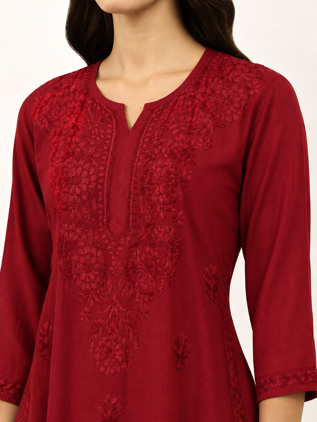 Elegant rayon Chikankari kurti for women with floral embroidery throughout the front, straight silhouette and versatile three-quarter sleeve design