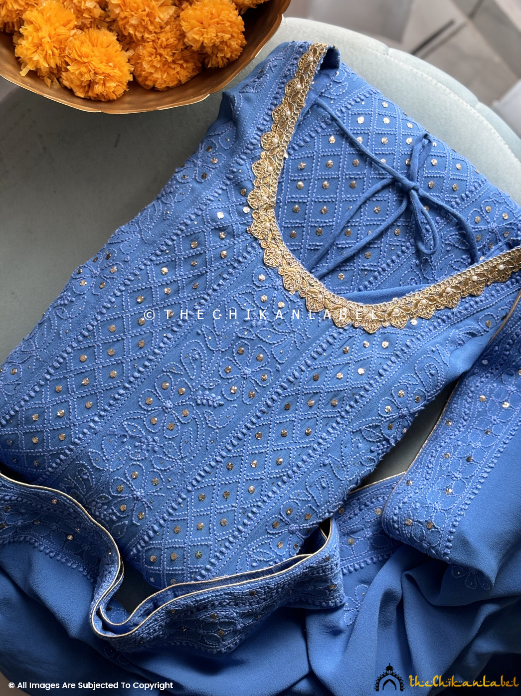 Party wear chikankari Anarkali styled with heels and statement earrings for a glam ethnic look