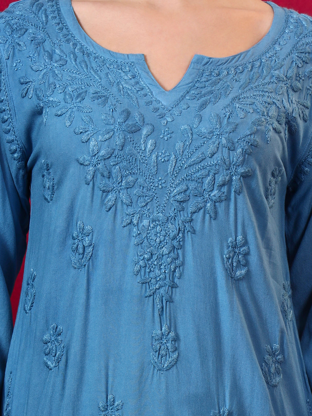 Shruti Rayon Short Kurti for women styled with straight pants, featuring elegant Chikankari embroidery and a comfortable regular fit suitable for office, college and casual outings.